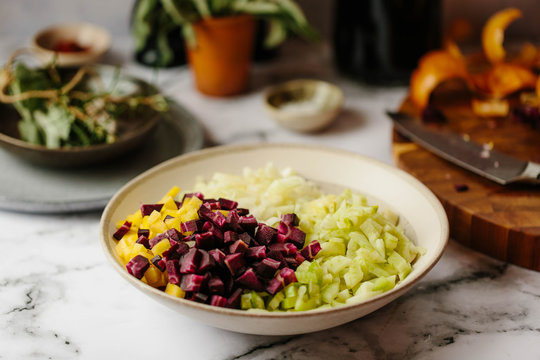 Preparation of a sofrito for a slow cooked dish.