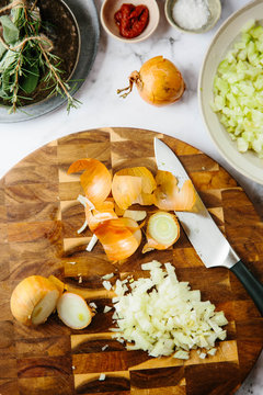 Preparation of a sofrito for a slow cooked dish.
