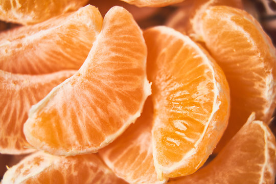 Sliced tangerines, close up, detail of slices