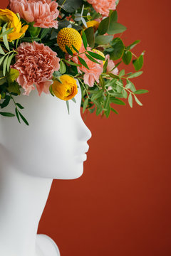 Flowers inside a mannequin?s head.