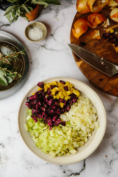 Preparation of a sofrito for a slow cooked dish.