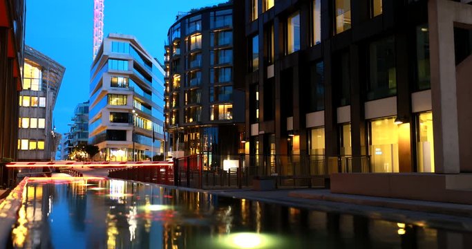 Oslo, Norway. Night View Embankment And Residential Multi-storey Houses In Tjuvholmen District. Summer Evening. Residential Area Reflected In Sea Waters. 4K.