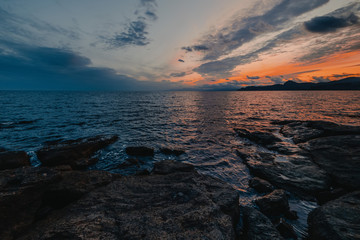 Sunset on the sea in blue tones