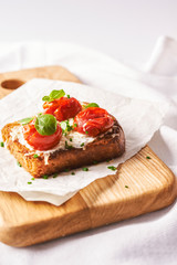 roasted bread, ricotta and grilled timatoes 