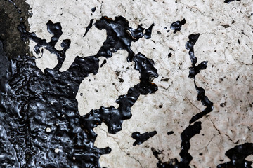 Background of dried spray of resin on an old wall painted with white paint.