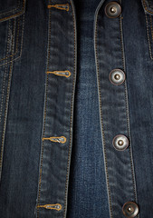 sewing denim jacket and buttons