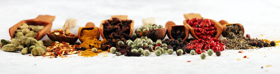Spices with pepper on table. Food and cuisine ingredients for cooking on rustic background - obrazy, fototapety, plakaty