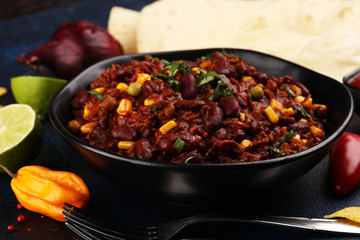 Hot chili con carne. mexican food tasty and spicy with red beans