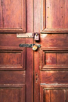 Door locked by padlocks