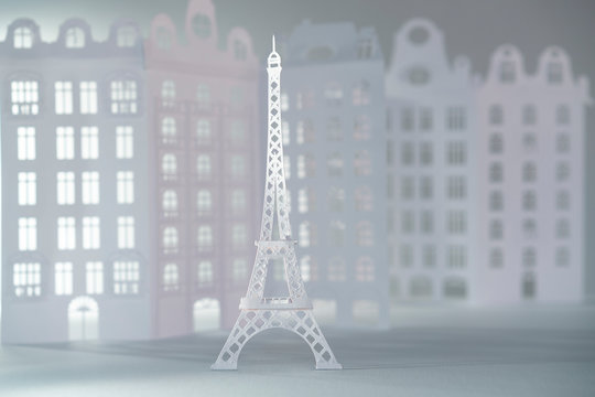 Paper cut Eiffel tower with Parisian architecture