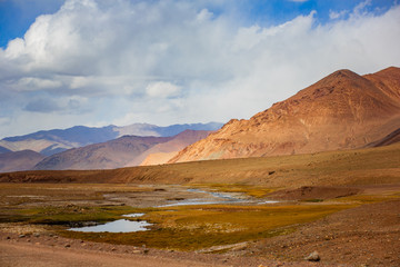 Landscape view of dusty road going far away nowhere