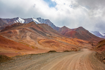 Landscape view of dusty road going far away nowhere