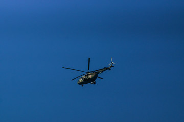 coast guard helicopter patrolling the coast