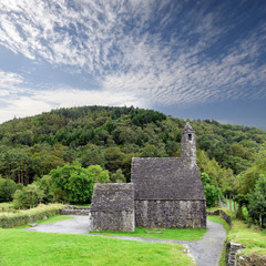Monastic cemetery of Glendalough, Ireland. Famous ancient monastery in the wicklow mountains with a...