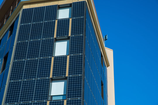 modern office building solar panels on the walls