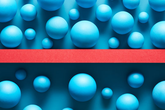 Composed blue spheres on sides of barrier