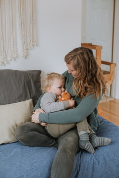 Mother Breastfeeding Young Son