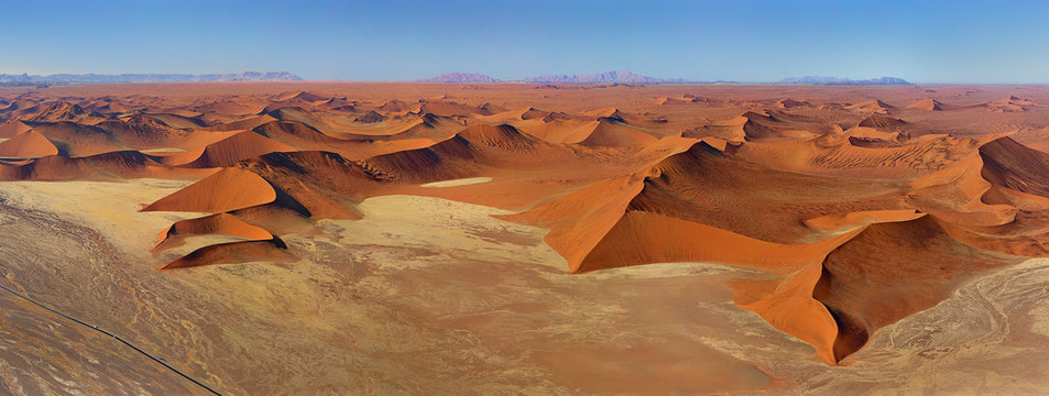 Aerial view of endless Namibia desert during daylight. © AmazingAerialAgency