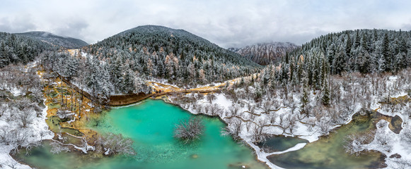 Panoramic aerial view of Huanglong covered with snow, Sichuan, China