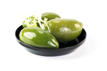 Mini snacks for buffet and banquet in a plastic bowl on a white background.