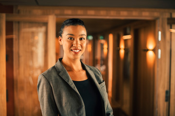 Portrait of smiling female professional at legal office