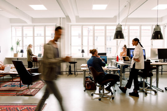 Business professionals working in creative office