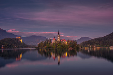 Colorful sunset landscape view of Lake Bled island and church, Slovenia