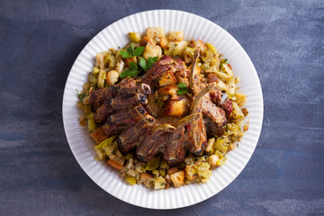 Crown roast of pork with apple and bread stuffing. View from above, top view