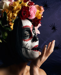 Young beautiful girl with traditional mexican death mask. Calavera Catrina. Sugar skull makeup