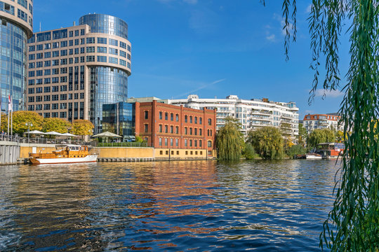 River Spree, newly designed area Spree-Bogen with buildings of the business center and hotel Villa Abion in Berlin, Germany