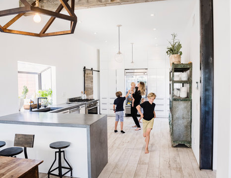 Mother and children in kitchen