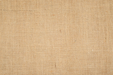 Hessian sackcloth burlap woven texture background  / cotton woven fabric background with flecks of...