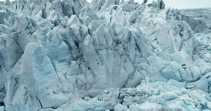 Aerial view of Folgefonna glacier top surface. Melting ice cap. Blue ice. Glacial pikes. Norway.