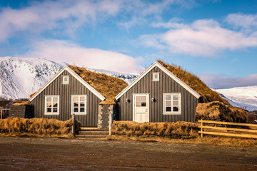 Icelandic earth turf houses in late winter, Arnarstapi, Iceland