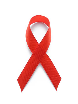 World AIDS day concept. Red ribbon or awareness ribbon as symbol for the solidarity of people living with HIV or AIDS.      