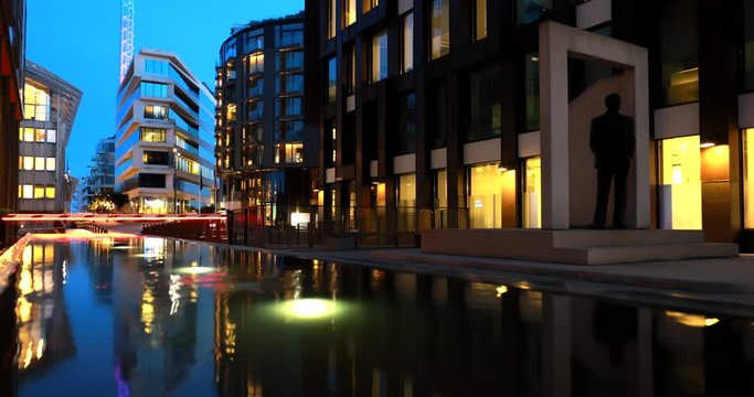 Oslo, Norway. Night View Embankment And Residential Multi-storey Houses In Tjuvholmen District. Summer Evening. Residential Area Reflected In Sea Waters. 4K.