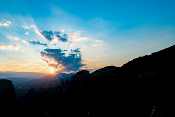 Sun sets over Meteora
