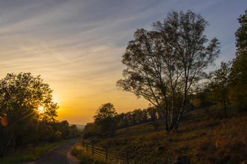 Fototapeta na wymiar Autumn countryside sunset walk