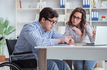 Disabled student studying and preparing for college exams