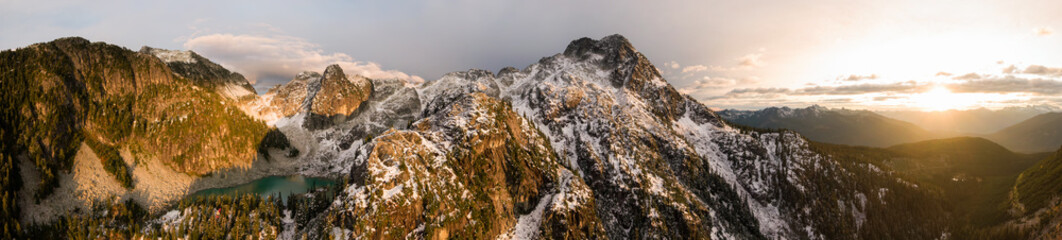 Aerial Panoramic View of Beautiful Canadian Mountain Landscape during a sunny sunset. Taken near Squamish, North of Vancouver, British Columbia, Canada.