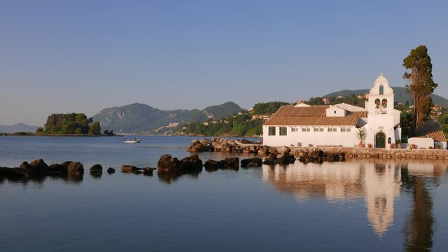 Early morning at Cape Kanoni, Corfu island, Greece. View of St. Vlacherna church and the island of Pontikonisi (Mouse Island).