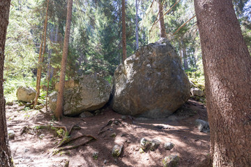 Bouldering in French Alps in Chamonix at a rock climbing park