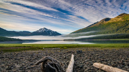 Small lake in Alaska with fog over the water