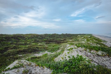 Sunrise and sunset along the dunes of Mustang Island on the Texas Coast