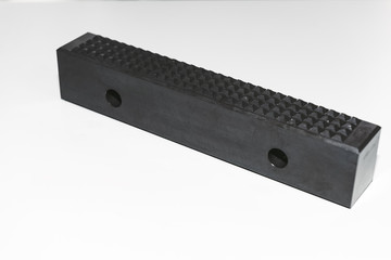 Custom-milled machine part made with CNC machine.