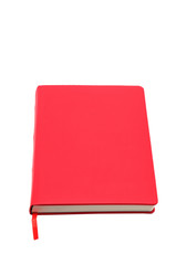Red notebook on a white background