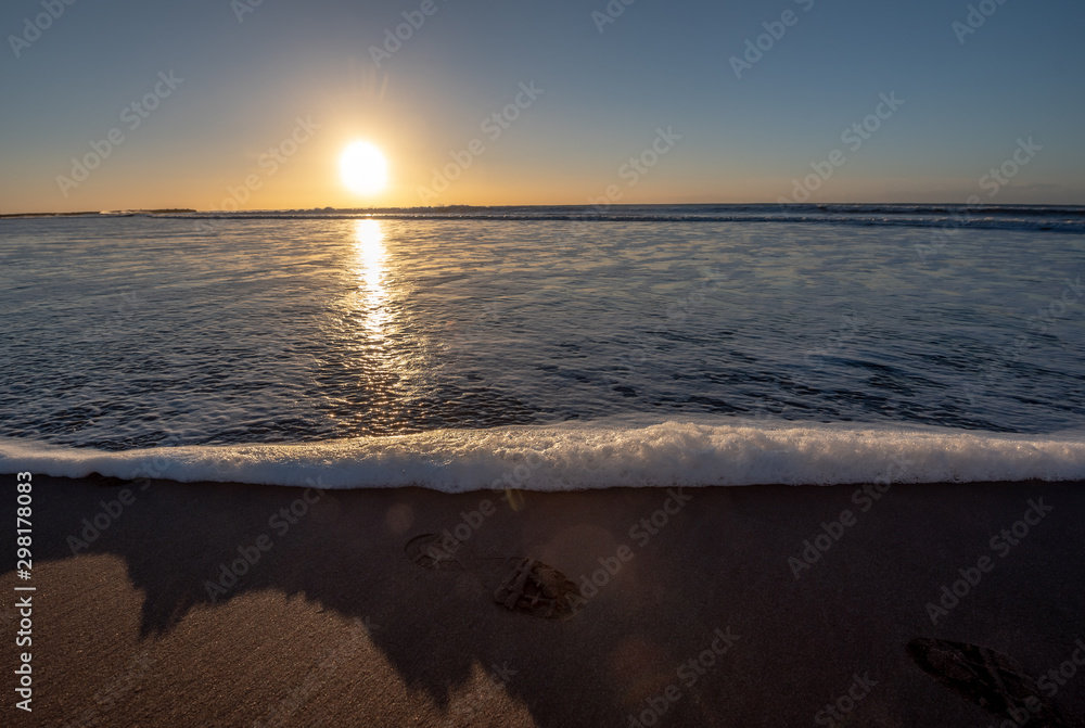 Wall mural sunrise on the beach