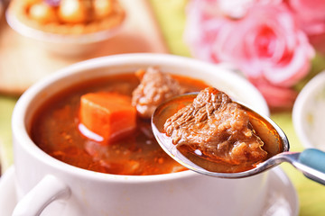 Braised beef with rice on the table