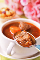 Braised beef with rice on the table