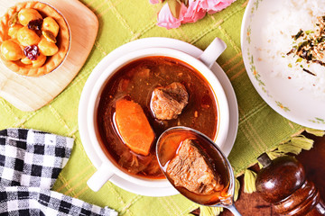 Braised beef with rice on the table
